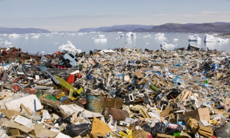 Rubbish dumped on the tundra outside llulissat in Greenland stand in stark contrast to icebergs behind from the Sermeq Kujullaq or llulissat Ice fjord – a Unesco world heritage site. Photograph: Global Warming Images/WWF-Canon 