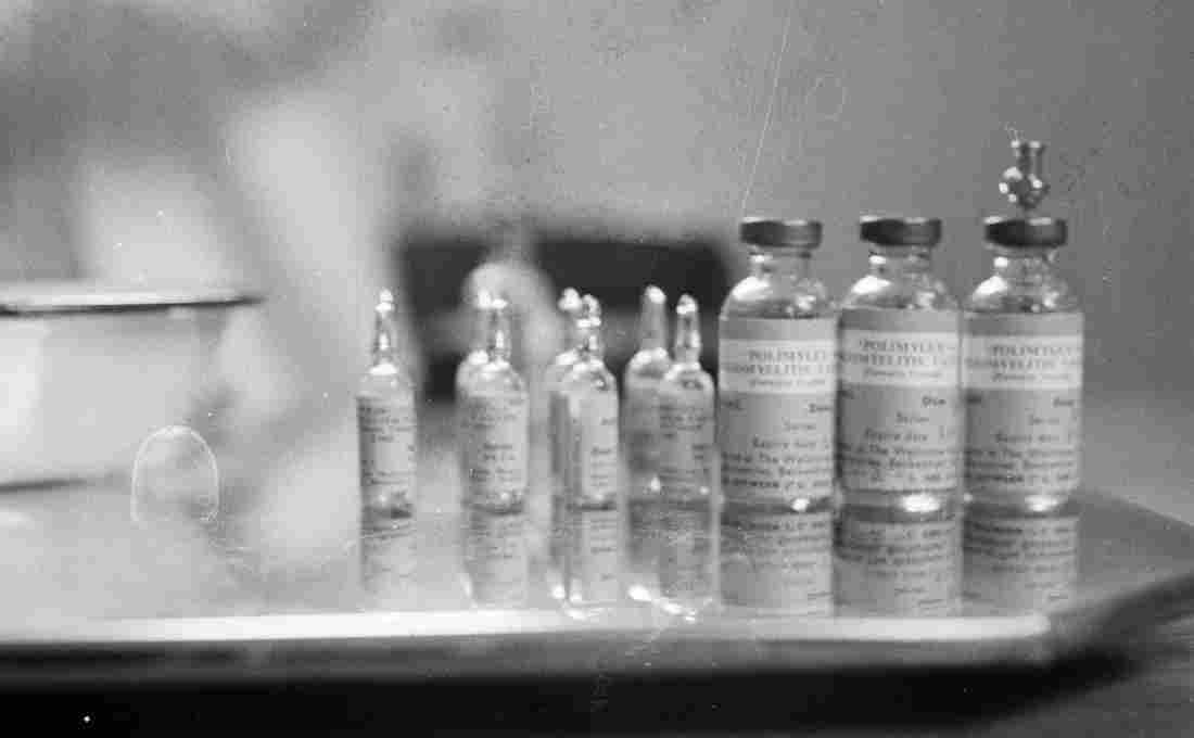 April 1959: Bottles containing the polio vaccine. M. McKeown/Getty Images 
