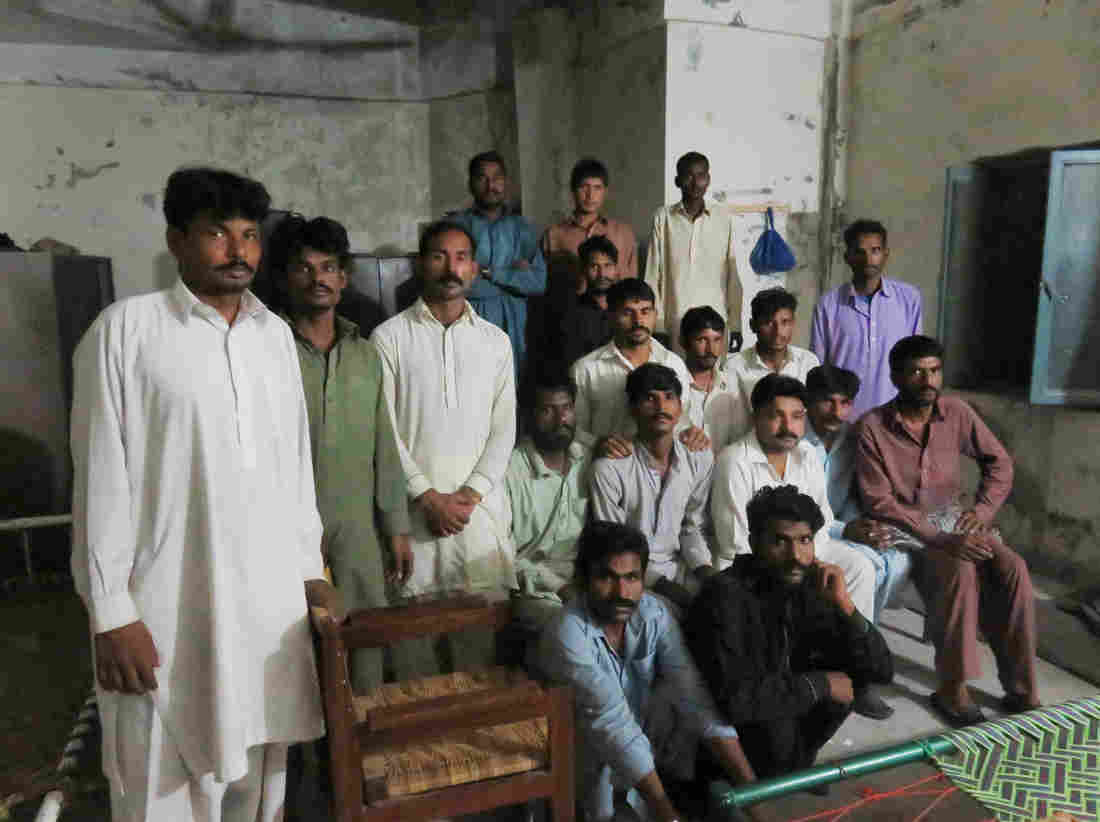 Some of the men imprisoned by a criminal gang in Pakistan's illicit kidney trade return to the apartment in Rawalpindi where they were held by force.