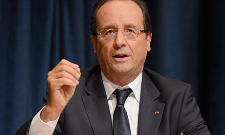 François Hollande has described the 2013 plans as a 'combat budget'. Photograph: Andrew Gombert/EPA